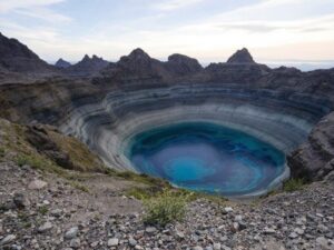 once a gemstone deposit is discovered, the mining process begins, pit mine