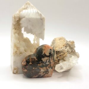 Unique gemstones and rustic decor from Mayhem Canyon Mineral Co featuring vibrant stone designs and southwestern style.